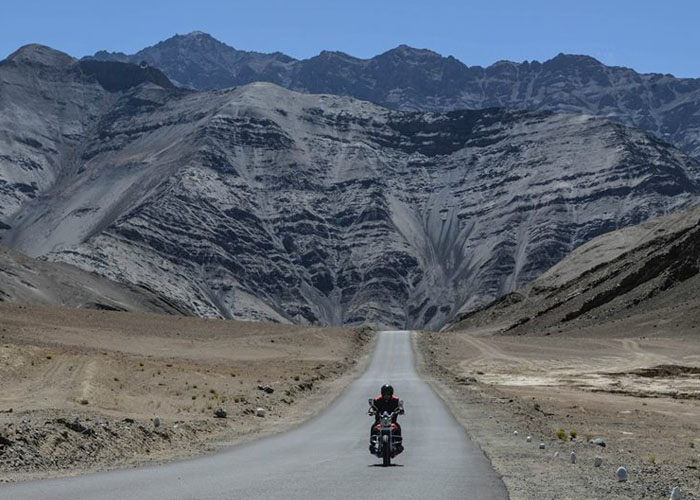 A Biker Riding on Leh Ladakh Highway