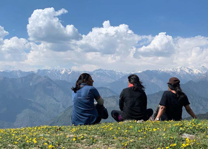 Three girls sitting on Phulara Ridge